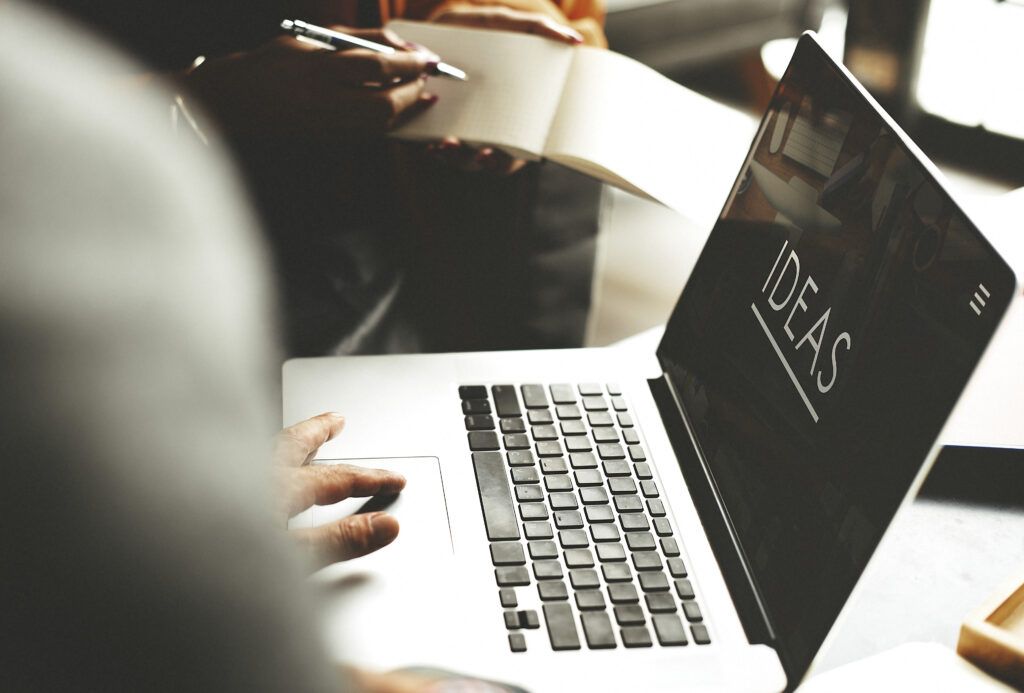 laptop with ideas word on screen